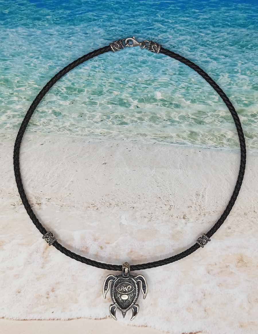 surf,mare,onde:collana artigianale con tartaruga  in stile maori.argento 925 brunito